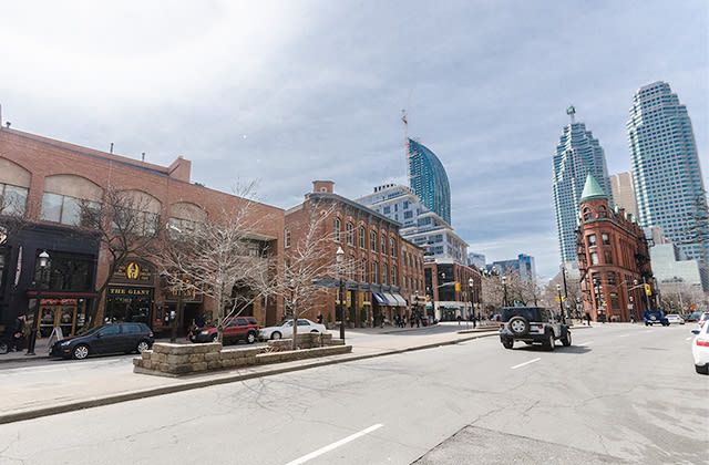 Front Street East in St. Lawrence Market with downtown towers behind